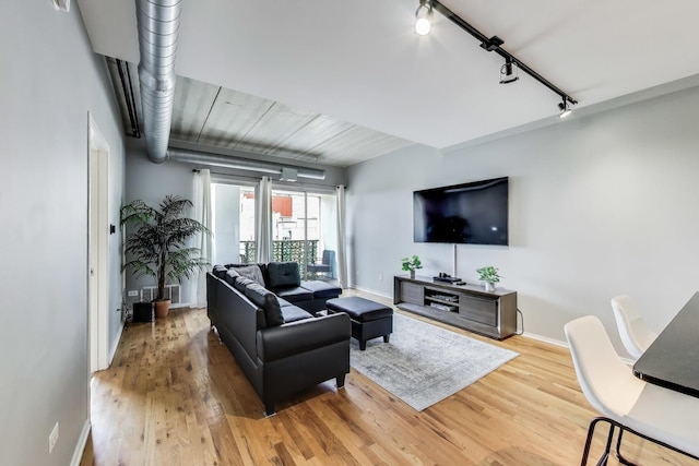 1430 S Michigan Ave Unit 510, Chicago, IL 60605 - living area with wood finished floors and track lighting
