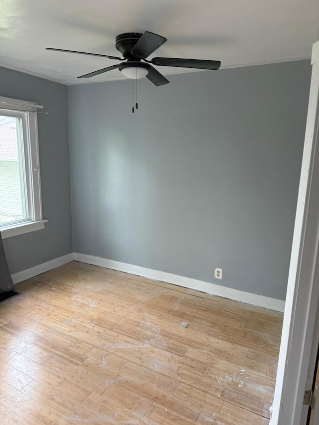 16021 Cottage Grove Ave, South Holland, IL 60473 - empty room with ceiling fan and light wood finished floors