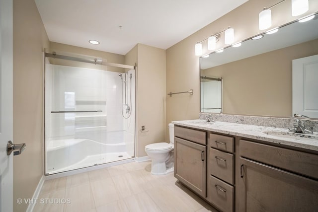 2150 Founders Dr Unit P109, Northbrook, IL 60062 - full bathroom with double vanity, a stall shower, tile patterned floors, and recessed lighting