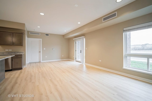 2150 Founders Dr Unit P109, Northbrook, IL 60062 - unfurnished living room featuring light wood-style floors and recessed lighting