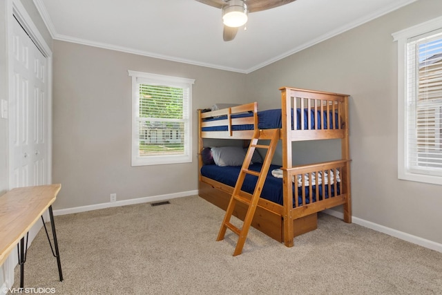 521 Everette Ave, Romeoville, IL 60446 - bedroom with carpet floors, ornamental molding, a closet, and ceiling fan