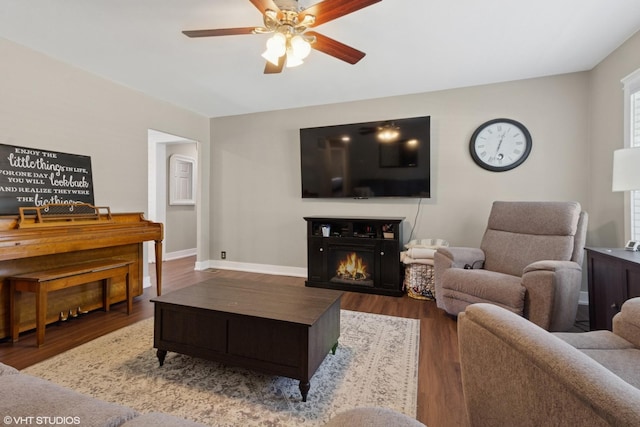 521 Everette Ave, Romeoville, IL 60446 - living room featuring ceiling fan, wood finished floors, and a warm lit fireplace