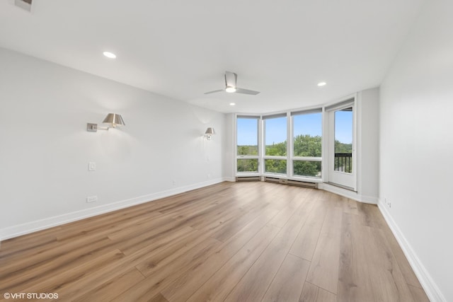 1140 Old Mill Rd Unit 505F, Hinsdale, IL 60521 - spare room with light wood-style floors, recessed lighting, and a ceiling fan