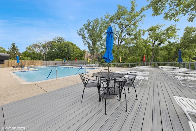 1140 Old Mill Rd Unit 505F, Hinsdale, IL 60521 - community pool with a patio and view of scattered trees