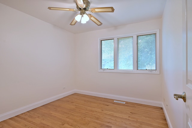 105 Haman Rd, Inverness, IL 60067 - unfurnished room featuring light wood-type flooring and ceiling fan