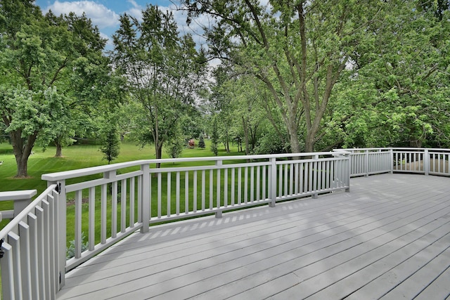105 Haman Rd, Inverness, IL 60067 - wooden deck with a lawn and view of wooded area