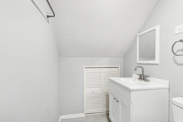 17304 Lathrop Ave, East Hazel Crest, IL 60429 - bathroom featuring lofted ceiling and vanity