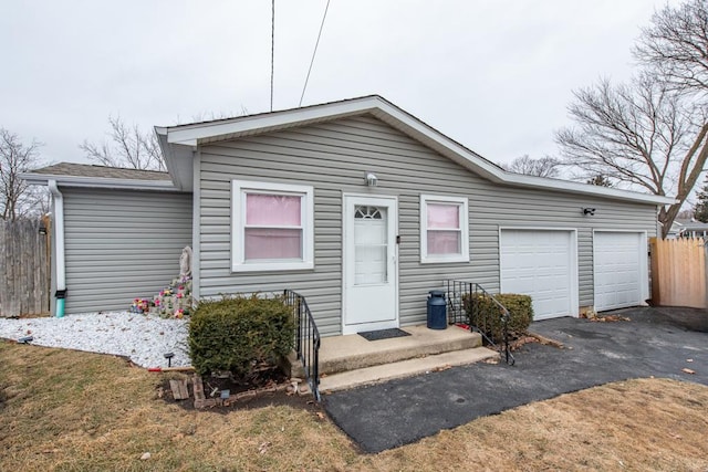 42478 N Lake Ave, Antioch, IL 60002 - view of front facade featuring an attached garage and asphalt driveway