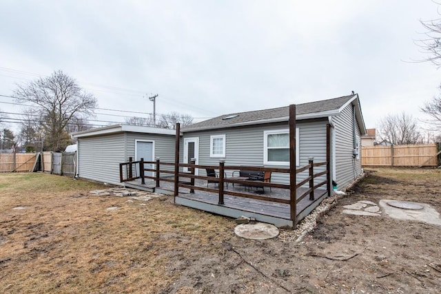 42478 N Lake Ave, Antioch, IL 60002 - view of front of property with a fenced backyard, a deck, and roof with shingles