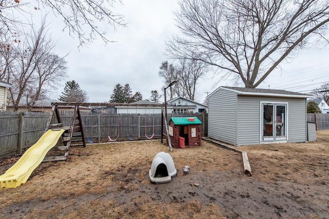 42478 N Lake Ave, Antioch, IL 60002 - fenced backyard with a playground and an outbuilding