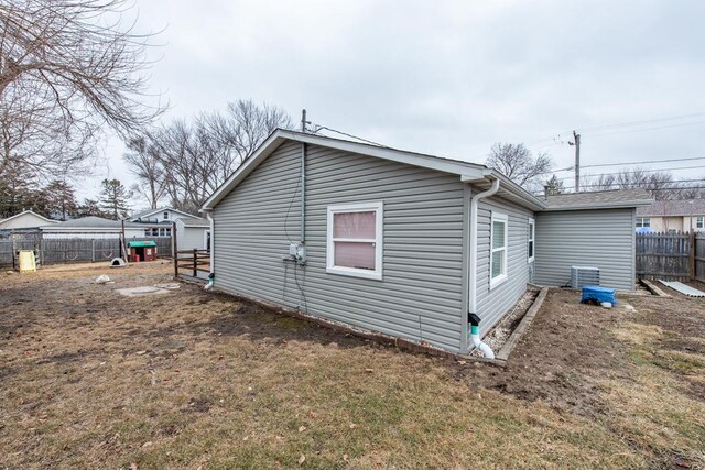 42478 N Lake Ave, Antioch, IL 60002 - view of property exterior featuring a fenced backyard and a central air condition unit