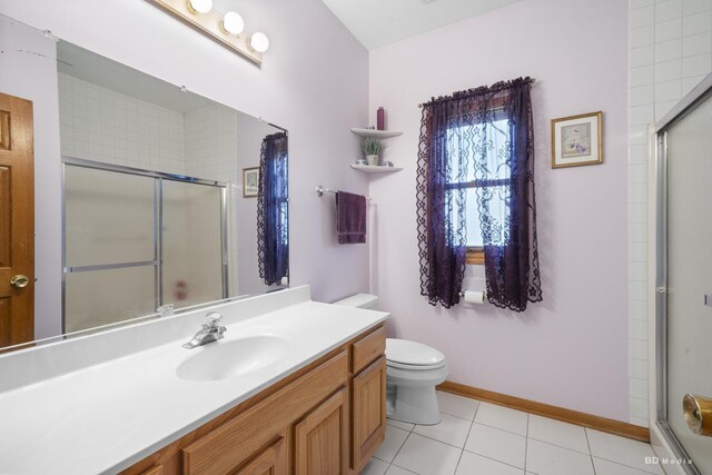 14879 Harbor Dr, Oak Forest, IL 60452 - full bathroom featuring vanity, a shower stall, and tile patterned flooring