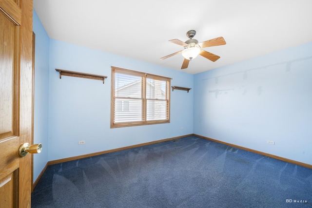 14879 Harbor Dr, Oak Forest, IL 60452 - spare room featuring dark carpet and ceiling fan