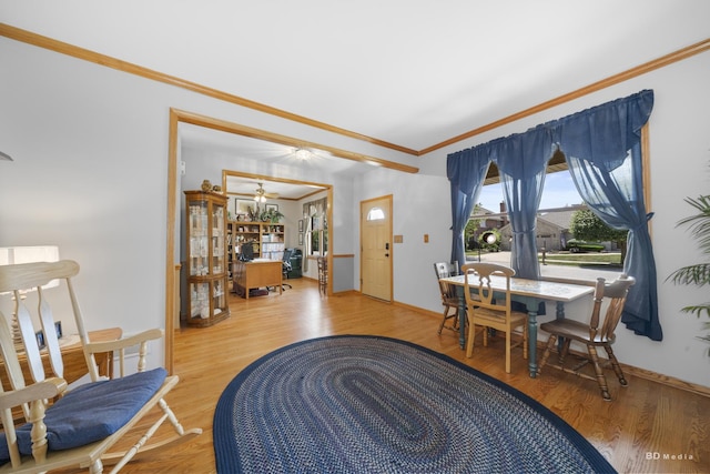 14879 Harbor Dr, Oak Forest, IL 60452 - dining area featuring wood finished floors and ornamental molding