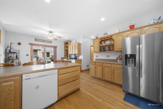 14879 Harbor Dr, Oak Forest, IL 60452 - kitchen with stainless steel fridge, white dishwasher, open shelves, light wood finished floors, and ceiling fan