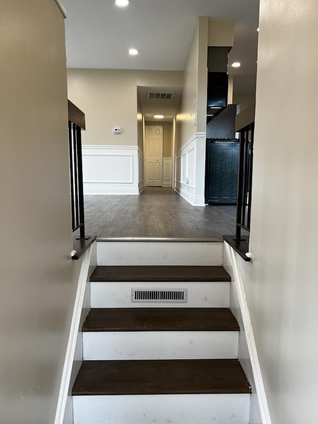 1318 Kingsbury Dr Unit 1, Hanover Park, IL 60133 - stairs with recessed lighting, wainscoting, wood finished floors, and a decorative wall