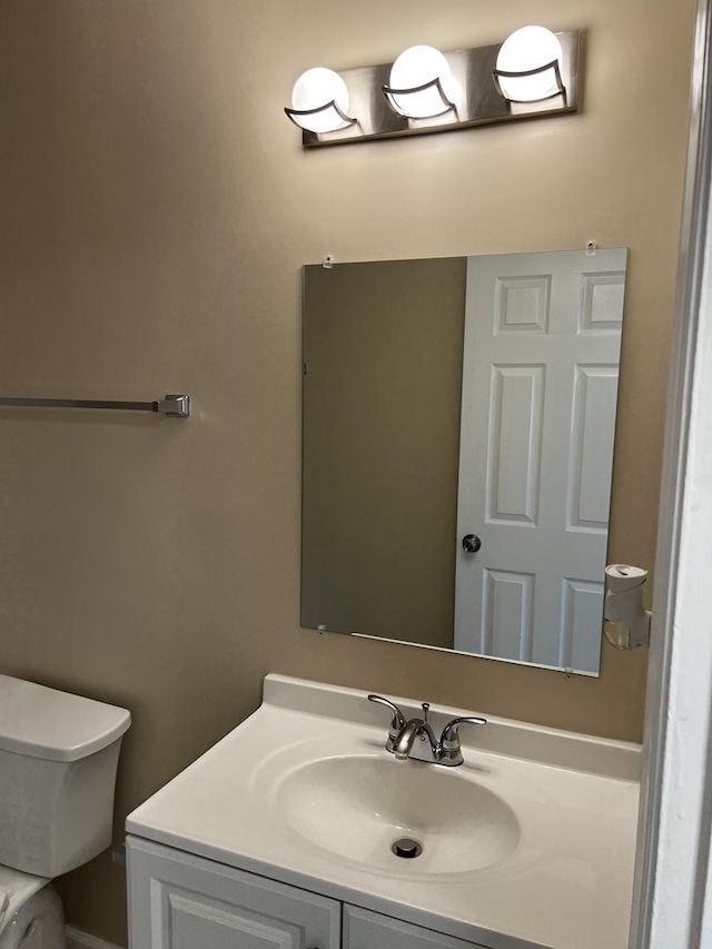 1318 Kingsbury Dr Unit 1, Hanover Park, IL 60133 - half bath with vanity and toilet