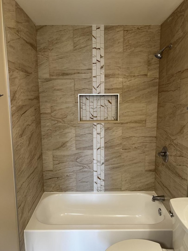 1318 Kingsbury Dr Unit 1, Hanover Park, IL 60133 - bathroom featuring toilet and washtub / shower combination