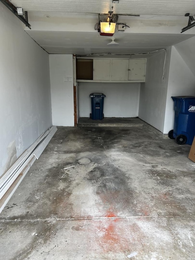 1318 Kingsbury Dr Unit 1, Hanover Park, IL 60133 - garage featuring a garage door opener