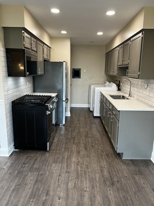 1318 Kingsbury Dr Unit 1, Hanover Park, IL 60133 - kitchen featuring black gas range, dark wood finished floors, backsplash, gray cabinets, and recessed lighting