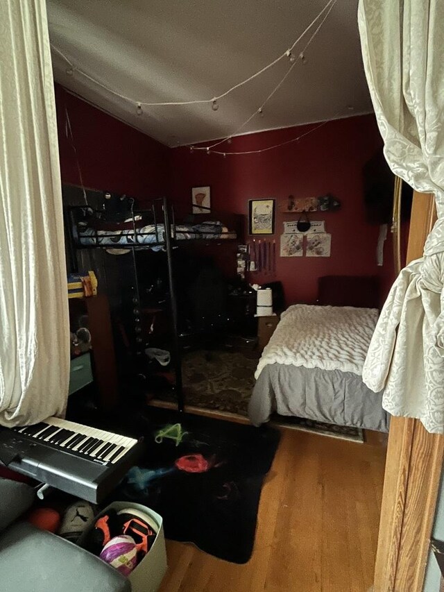 1330 W Norwood Ave, Chicago, IL 60660 - bedroom featuring wood finished floors and lofted ceiling