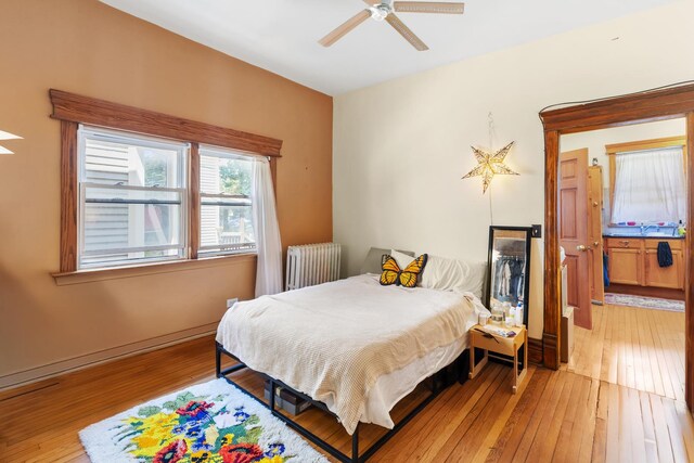 1330 W Norwood Ave, Chicago, IL 60660 - bedroom with radiator and light wood finished floors