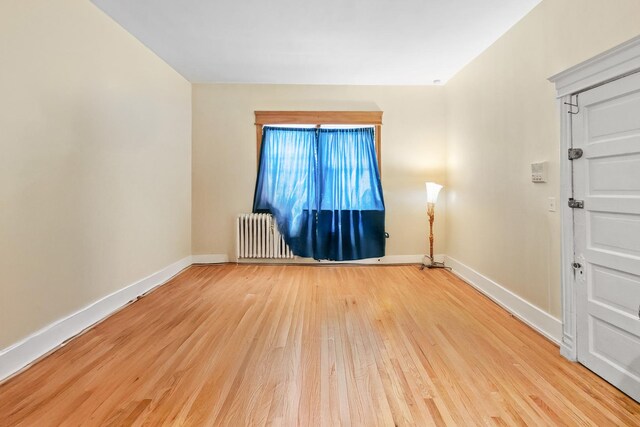 1330 W Norwood Ave, Chicago, IL 60660 - unfurnished room featuring wood finished floors and baseboards