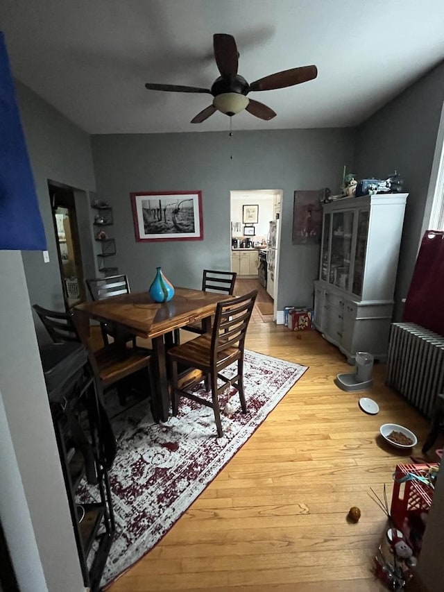 1330 W Norwood Ave, Chicago, IL 60660 - dining space featuring a ceiling fan and light wood-type flooring