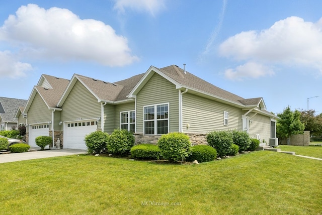 15701 Cove Cir, Plainfield, IL 60544 - view of front of house featuring stone siding, a front yard, driveway, and a shingled roof