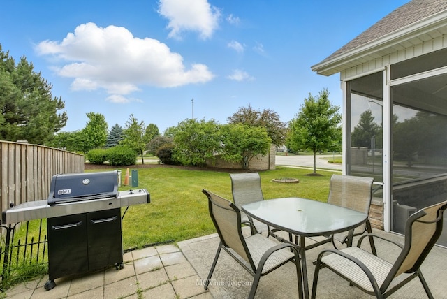 15701 Cove Cir, Plainfield, IL 60544 - view of patio / terrace featuring grilling area, outdoor dining area, and a sunroom