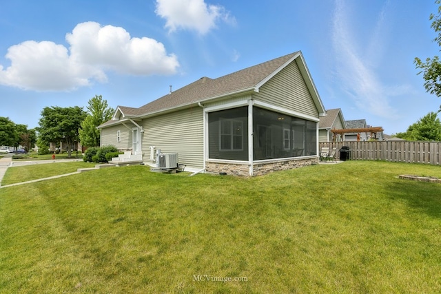 15701 Cove Cir, Plainfield, IL 60544 - view of side of property featuring a sunroom, roof with shingles, and stone siding