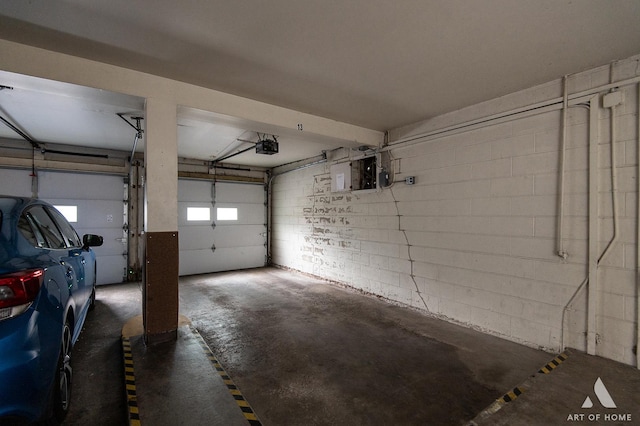 101 N Peartree Ln Unit 101, Arlington Heights, IL 60004 - garage with concrete block wall and a garage door opener