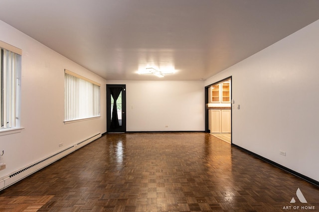 101 N Peartree Ln Unit 101, Arlington Heights, IL 60004 - spare room featuring a baseboard radiator and baseboards