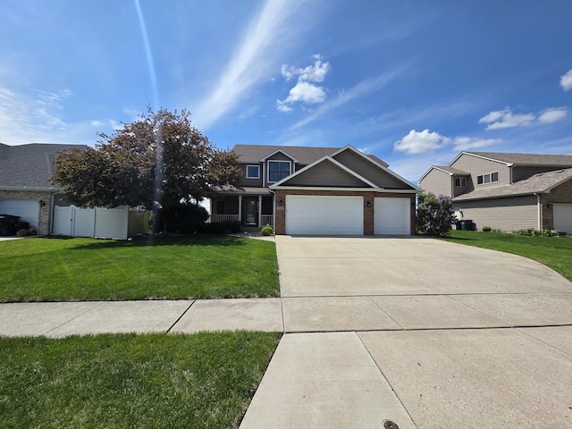 723 Casey Dr, Minooka, IL 60447 - traditional-style house with concrete driveway, a garage, and brick siding