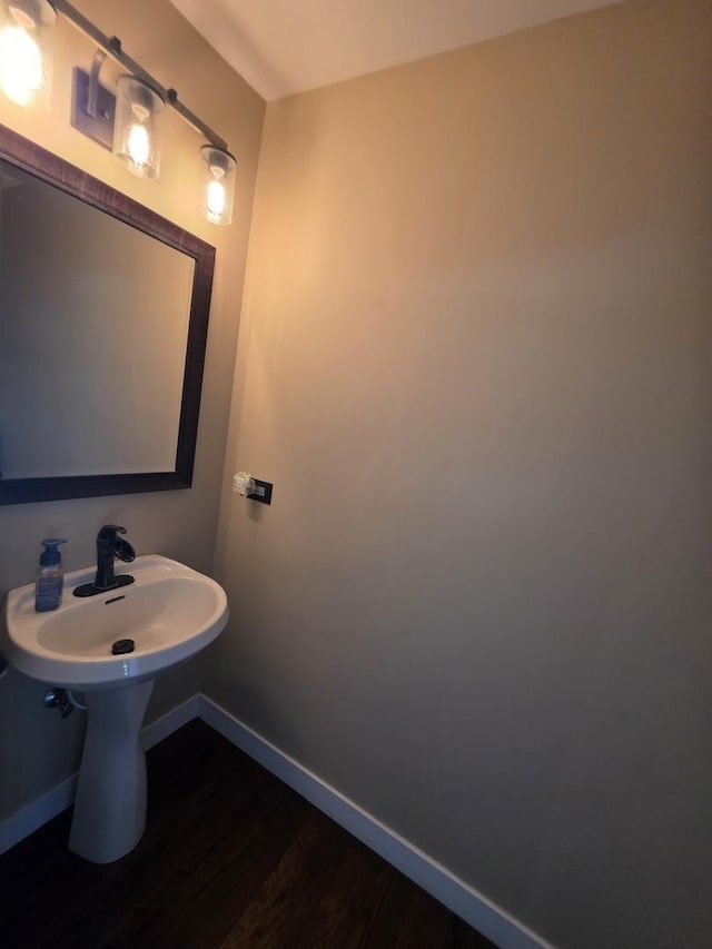 723 Casey Dr, Minooka, IL 60447 - bathroom featuring wood finished floors and baseboards