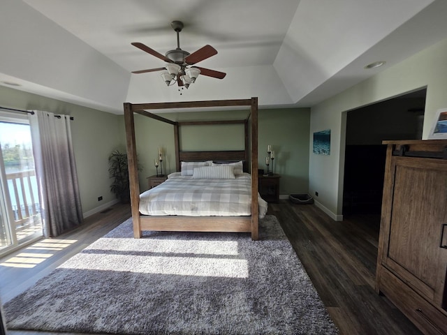 723 Casey Dr, Minooka, IL 60447 - bedroom with dark wood-type flooring, lofted ceiling, access to exterior, and a ceiling fan