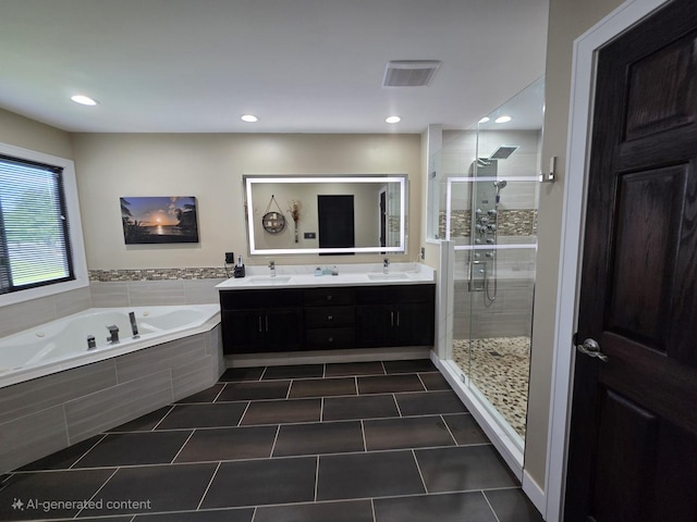 723 Casey Dr, Minooka, IL 60447 - bathroom with a bath, a shower stall, double vanity, recessed lighting, and tile patterned flooring