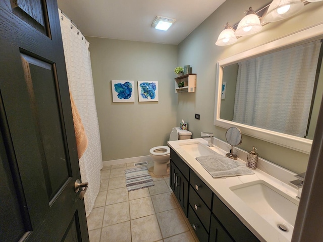 723 Casey Dr, Minooka, IL 60447 - bathroom featuring tile patterned floors and double vanity