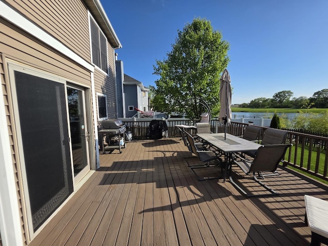 723 Casey Dr, Minooka, IL 60447 - deck featuring outdoor dining area, a water view, and grilling area