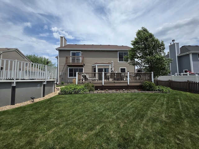 723 Casey Dr, Minooka, IL 60447 - back of property with a chimney and a deck