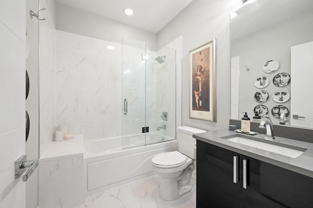 1008 N Larrabee St Unit 2S, Chicago, IL 60610 - full bathroom featuring bath / shower combo with glass door, vanity, marble look tile flooring, and recessed lighting