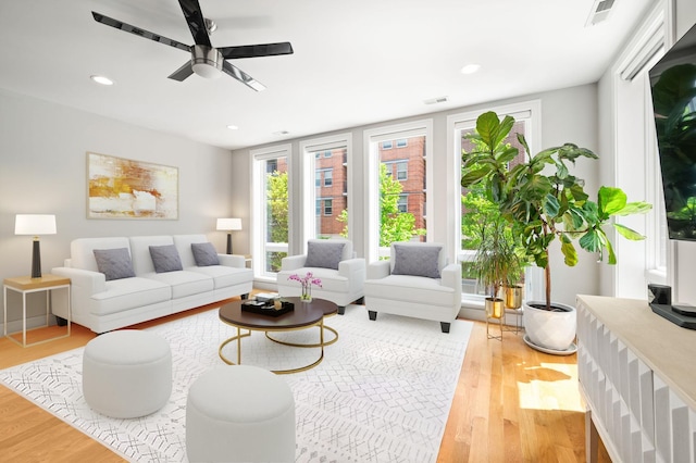 1008 N Larrabee St Unit 2S, Chicago, IL 60610 - living room featuring light wood-style flooring, a ceiling fan, and recessed lighting