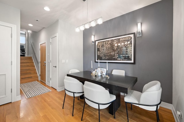 1008 N Larrabee St Unit 2S, Chicago, IL 60610 - dining area with stairway, light wood-style floors, and recessed lighting