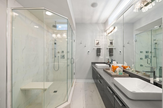 1008 N Larrabee St Unit 2S, Chicago, IL 60610 - bathroom with a marble finish shower, marble finish flooring, and double vanity