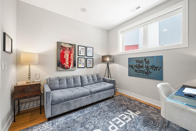 1008 N Larrabee St Unit 2S, Chicago, IL 60610 - living area featuring wood finished floors and baseboards