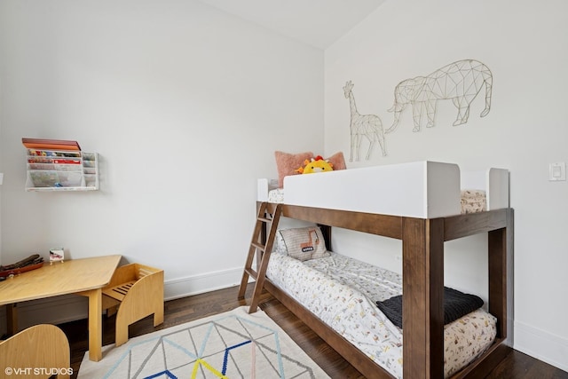 2242 W Lawrence Ave Unit 203, Chicago, IL 60625 - bedroom with baseboards and wood finished floors