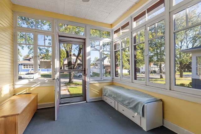 808 Glenwood Ave, Joliet, IL 60435 - unfurnished sunroom with hardwood / wood-style floors and an ornate ceiling