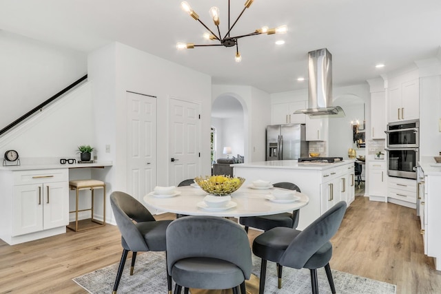 7612 Cascade Way, Gurnee, IL 60031 - dining room with arched walkways, a chandelier, light wood finished floors, and recessed lighting
