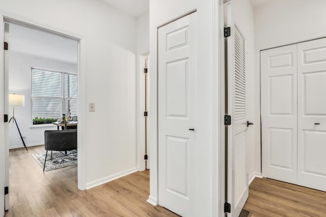 7612 Cascade Way, Gurnee, IL 60031 - hall featuring light wood-type flooring and baseboards
