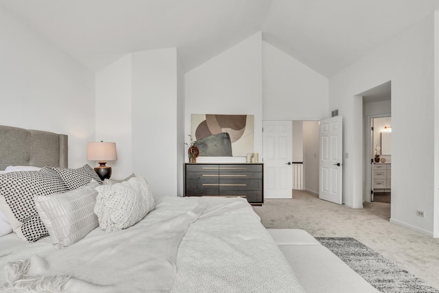 7612 Cascade Way, Gurnee, IL 60031 - bedroom with high vaulted ceiling, light carpet, and connected bathroom